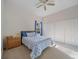 Bedroom with carpet flooring, ceiling fan, closet and a bright window at 2114 147Th E Ct, Bradenton, FL 34212