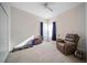 Bright bedroom with lots of natural light, ceiling fan, and comfortable seating at 2114 147Th E Ct, Bradenton, FL 34212