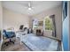 Bright office includes two large windows, a desk, and an office chair for a pleasant workplace at 2114 147Th E Ct, Bradenton, FL 34212