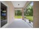 Relaxing screened porch with view of the outdoors, perfect for enjoying nature and fresh air at 2114 147Th E Ct, Bradenton, FL 34212