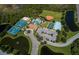 Aerial view of tennis court, basketball court, pool, and park at 2160 Chenille Ct, Venice, FL 34292