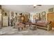Spacious living room showcasing tile flooring, unique decor, and a ceiling fan at 2230 Myakka Rd, Sarasota, FL 34240