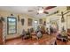 Spacious living room featuring wood floors, plenty of seating, and natural light at 2230 Myakka Rd, Sarasota, FL 34240