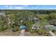 Aerial view of the home showcasing the surrounding trees and neighborhood at 3466 Tanglewood Dr, Sarasota, FL 34239