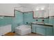 Charming bathroom with blue tile, classic fixtures, and a corner bathtub at 3466 Tanglewood Dr, Sarasota, FL 34239