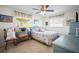 Charming bedroom featuring a floral-patterned bedspread and matching vintage dressers at 3502 18Th Avenue W Dr, Bradenton, FL 34205
