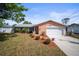 Charming single-story home with a well-manicured lawn and a two-car garage at 3502 18Th Avenue W Dr, Bradenton, FL 34205