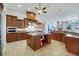 Spacious kitchen featuring custom cabinetry, granite countertops, and modern stainless steel appliances at 3551 Ridgeland Ct, Punta Gorda, FL 33982