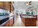 Gourmet kitchen with a large island, high-end appliances, and plenty of counter space for cooking at 3551 Ridgeland Ct, Punta Gorda, FL 33982