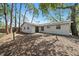 A nice backyard with plenty of shade offered by lots of trees at 3909 Linwood St, Sarasota, FL 34232