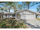 Charming single-story home with attached garage, well-kept landscaping, and traditional design at 3909 Linwood St, Sarasota, FL 34232