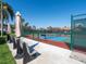 Relaxing bench seating located courtside allows for a comfortable viewing experience at 3922 Wilshire Cir # 177, Sarasota, FL 34238
