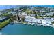 Stunning aerial view showcasing the waterfront homes with access to docks and boat launches at 401 63Rd St, Holmes Beach, FL 34217