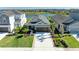 Beautiful home with a well-kept lawn and landscaping, situated near a serene lake at 4253 Pond Brook Ct, Bradenton, FL 34211