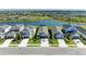 Scenic neighborhood with a lake, showcasing manicured lawns and well-spaced homes at 4253 Pond Brook Ct, Bradenton, FL 34211