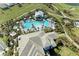 Aerial view of pool, clubhouse and golf course at 4253 Pond Brook Ct, Bradenton, FL 34211