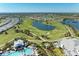 Aerial view of community golf course and pool at 4253 Pond Brook Ct, Bradenton, FL 34211