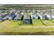 Picturesque aerial view of backyard, pool, and lake, a perfect location to unwind at 4253 Pond Brook Ct, Bradenton, FL 34211