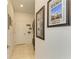 Bright laundry room with tile floor and convenient access to utilities and decor at 4253 Pond Brook Ct, Bradenton, FL 34211