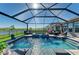 Lovely screened-in pool and spa with cozy outdoor seating and landscaping, perfect for relaxation at 4253 Pond Brook Ct, Bradenton, FL 34211
