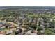 Panoramic aerial shot showcasing a residential neighborhood with golf course and ponds at 4283 Southwell Way, Sarasota, FL 34241