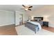Primary bedroom with a ceiling fan, neutral decor, and a comfortable layout at 4283 Southwell Way, Sarasota, FL 34241