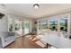 Office featuring wood floors, a large windows, and golf course view at 4283 Southwell Way, Sarasota, FL 34241