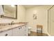 Bathroom featuring granite countertops, stylish vanity, and enclosed shower at 4404 Calle Serena, Sarasota, FL 34238