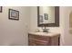 Elegant bathroom featuring a granite countertop vanity with attractive fixtures at 4404 Calle Serena, Sarasota, FL 34238