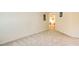 Empty bedroom with plush neutral carpet perfect for customization at 4404 Calle Serena, Sarasota, FL 34238