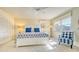 Inviting bedroom features a ceiling fan, and large windows for natural light at 4404 Calle Serena, Sarasota, FL 34238
