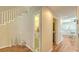 Entryway showcasing the staircase and architectural details, leading to the home's main living areas at 4404 Calle Serena, Sarasota, FL 34238
