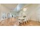 Bright and airy living room with high ceilings, hardwood floors, and access to the outdoor patio at 4404 Calle Serena, Sarasota, FL 34238