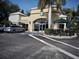 Exterior shot of Starbucks building showing drive-thru and outside seating at 4453 Meadow Creek Cir, Sarasota, FL 34233