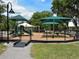 This modern playground offers shaded play areas and is perfect for children at 4453 Meadow Creek Cir, Sarasota, FL 34233