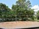 Playground swings provide an opportunity for fun at 4453 Meadow Creek Cir, Sarasota, FL 34233