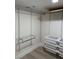Well-organized closet with adjustable shelving and storage bins at 4460 Fairways Blvd # 304, Bradenton, FL 34209