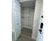 Open closet with adjustable wire shelving and rod, offering ample storage space at 4460 Fairways Blvd # 304, Bradenton, FL 34209