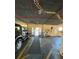 Underground parking space showing a black SUV and exit leading to building entrance at 4460 Fairways Blvd # 304, Bradenton, FL 34209