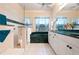 Bathroom with walk-in shower, garden tub, and double vanity at 4464 Mcintosh Lake Ave, Sarasota, FL 34233