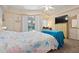 Spacious bedroom with large windows overlooking the pool area at 4464 Mcintosh Lake Ave, Sarasota, FL 34233