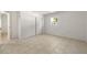 Bedroom with tile floor, large window, closet, and white walls at 510 Marlin Dr, Punta Gorda, FL 33950