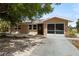 Charming single-story home featuring a screened in garage, and a well-maintained landscaped yard at 510 Marlin Dr, Punta Gorda, FL 33950