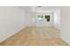 Bright and airy living room with neutral tile flooring, complemented by natural light from windows at 510 Marlin Dr, Punta Gorda, FL 33950