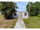 Exterior view of the detached storage shed, offering extra storage space at 510 Marlin Dr, Punta Gorda, FL 33950