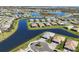 Expansive aerial view of a residential community featuring serene waterways and well-maintained properties at 5311 White Sand Cv, Bradenton, FL 34211