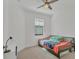Cozy bedroom features carpeted floor and one window at 5311 White Sand Cv, Bradenton, FL 34211