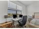 Bedroom featuring a view with a built-in desk that offers comfort and functionality at 5311 White Sand Cv, Bradenton, FL 34211