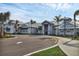 Well-maintained community clubhouse with manicured landscaping and ample parking at 5311 White Sand Cv, Bradenton, FL 34211