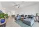 Open floor plan showcasing spacious living room with tiled floors and modern decor at 5311 White Sand Cv, Bradenton, FL 34211